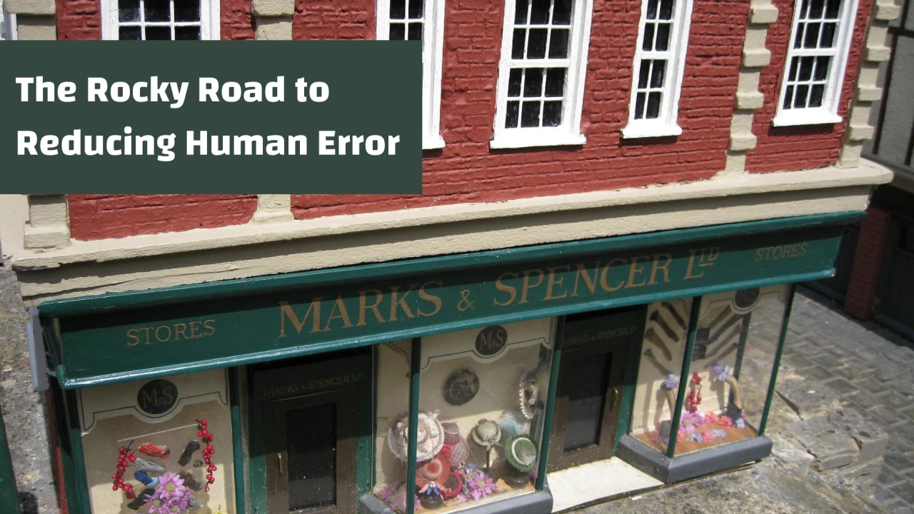 Title card "The Rocky Road to Reducing Human Error" over a miniature model of a Marks & Spencer shopfront